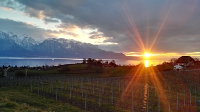 A scenic view of Villa La Angostura with mountains in the background and the wine shop facade.