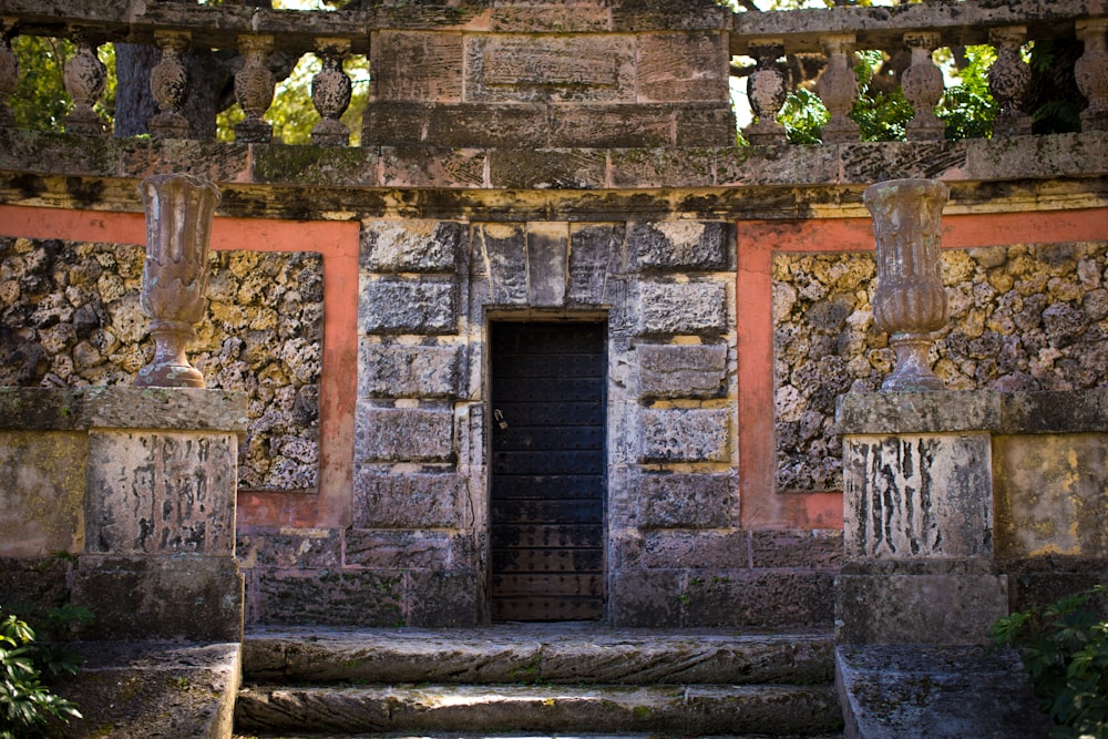 orange and gray stone building with doorway