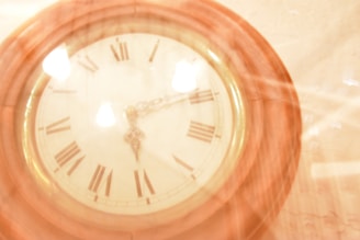 Elegant depiction of a clock with blurred hands symbolizing lost time.