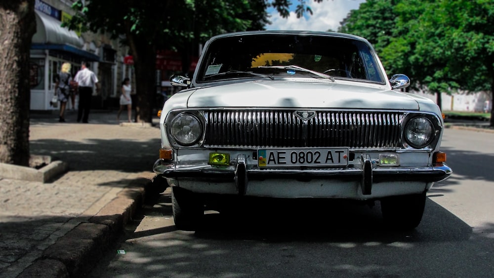 white car on road