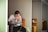 man wearing white top using MacBook