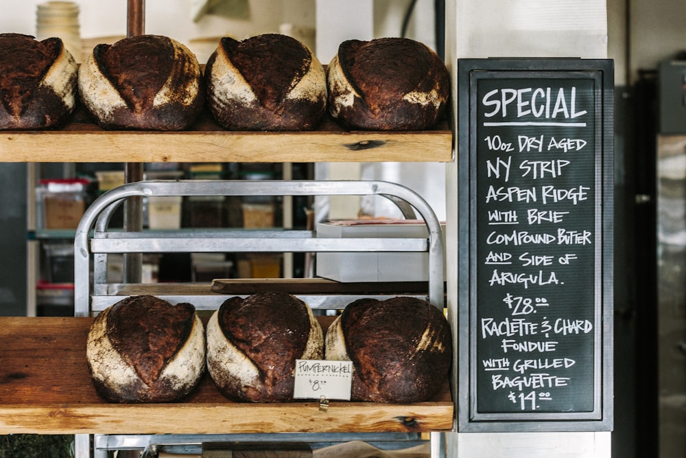breads on brown wooden shelf