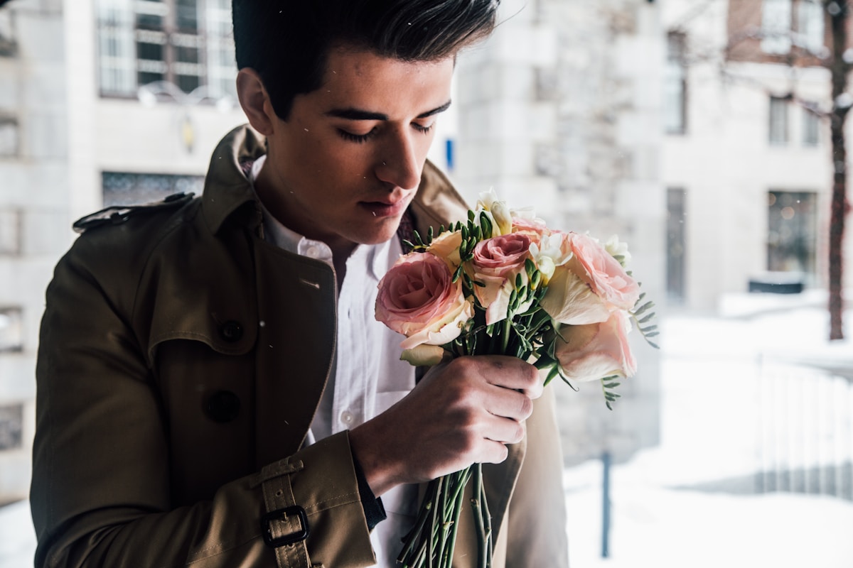 Man holding flowers