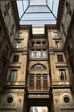 photo of brown concrete building interior