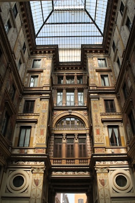 photo of brown concrete building interior