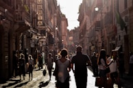 A bustling street scene with people discussing politics.