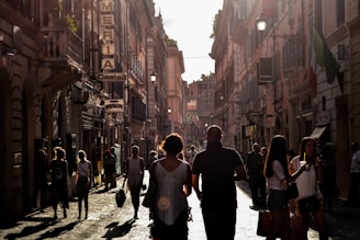 A bustling street scene with people discussing politics.