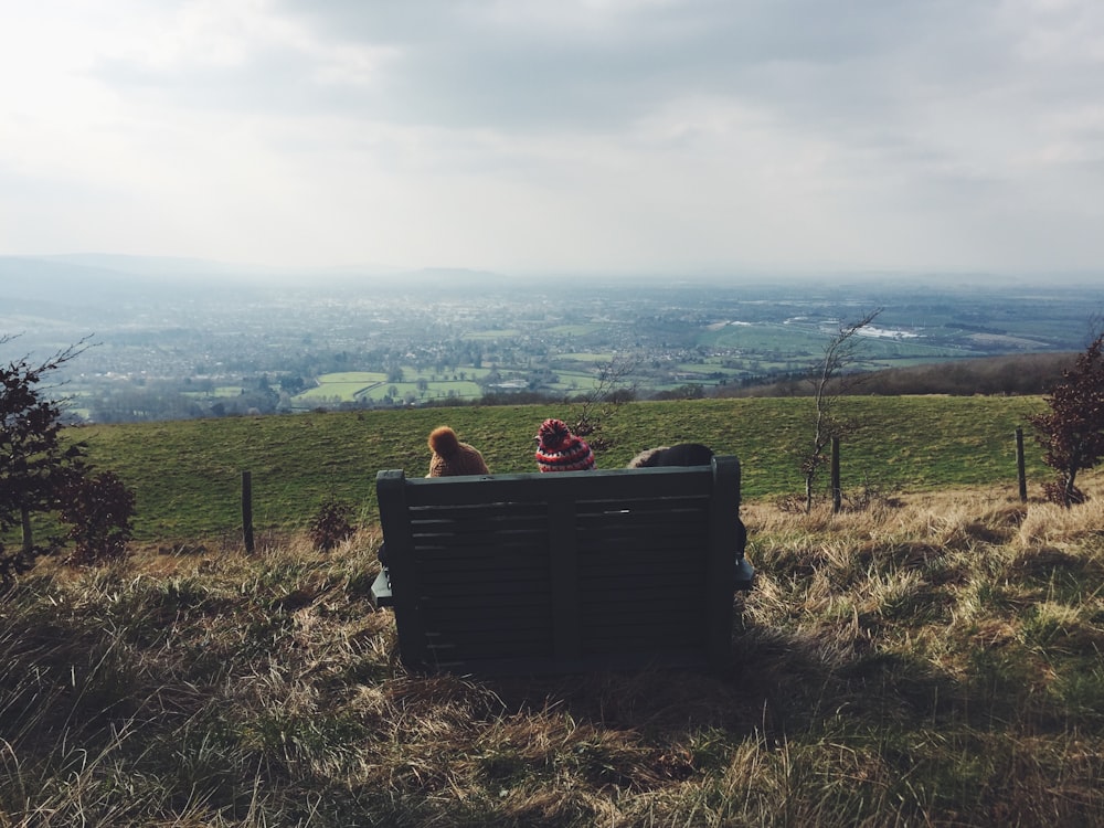 two children sitting on bench