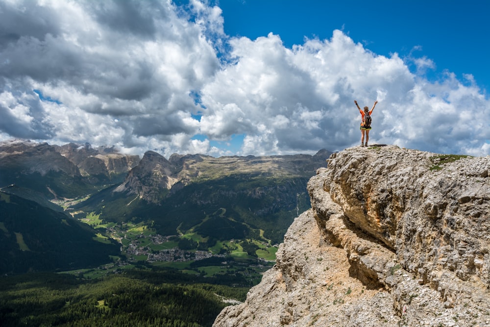 woman standing on mountain