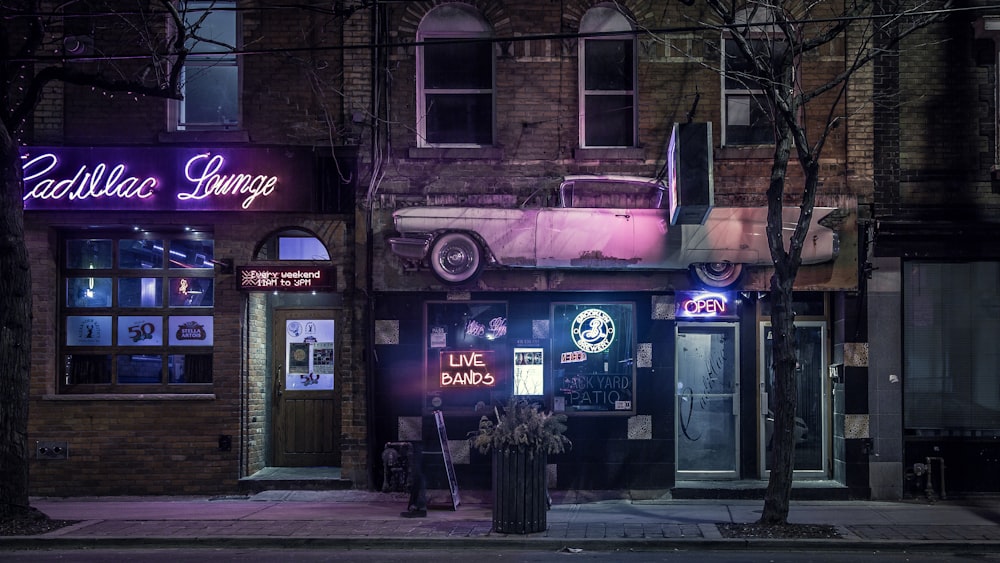 white LED neon signage on store