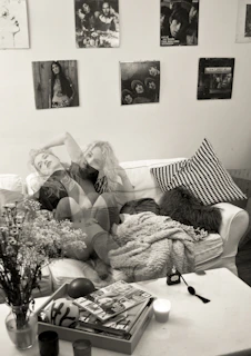 A cozy modern living room featuring a bold black and white photography print from Minimal Muse Prints.