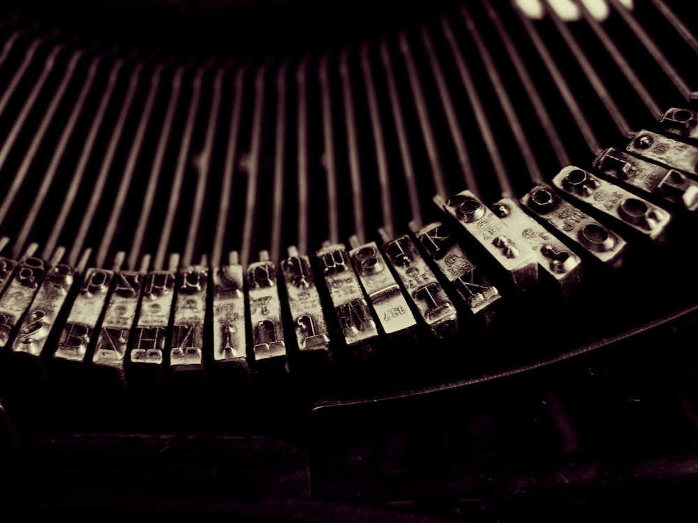 Close-up of typebars in a typewriter