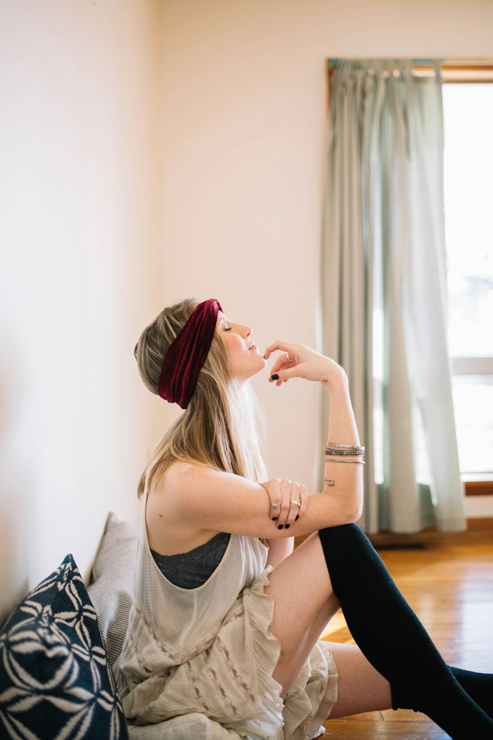 woman sitting on floor