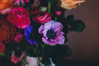 A vibrant assortment of colorful loose flowers freshly picked and arranged.