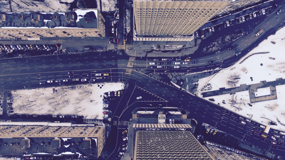 aerial photography of road between buildings