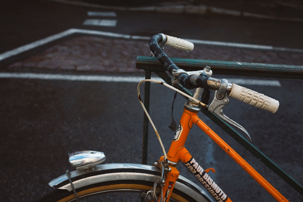 bicycle locked into steel rail