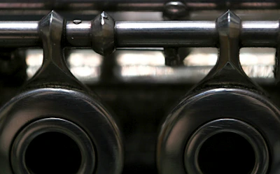 Detailed shot of a metal indexing component with a modern, clean background.