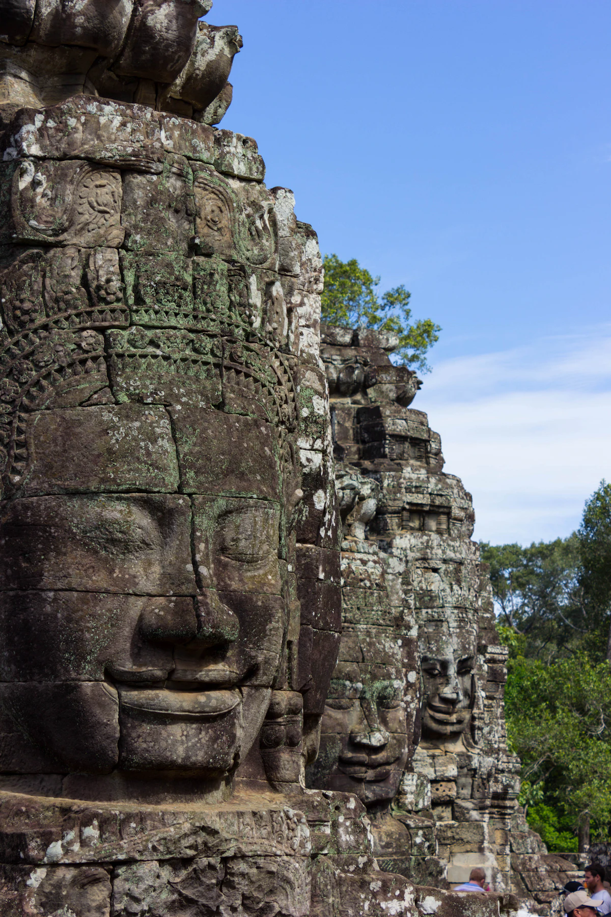 Stone faces carved on the Bayon temple at Angkor Thom