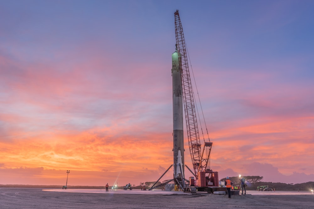 orange and white tower crane