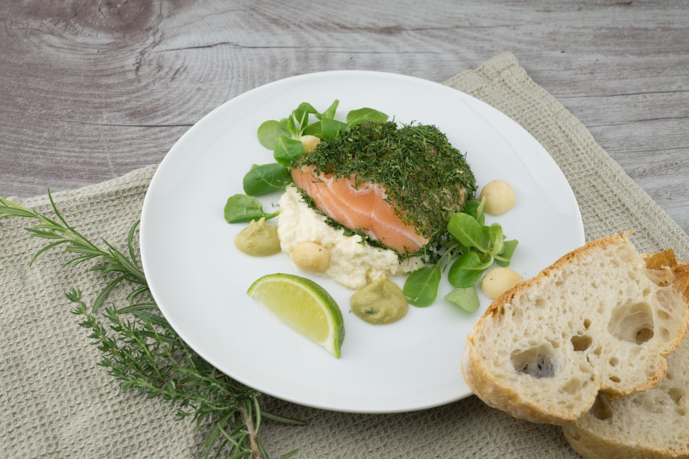 round white ceramic plate with lime on top