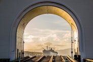ship near tunnel during day