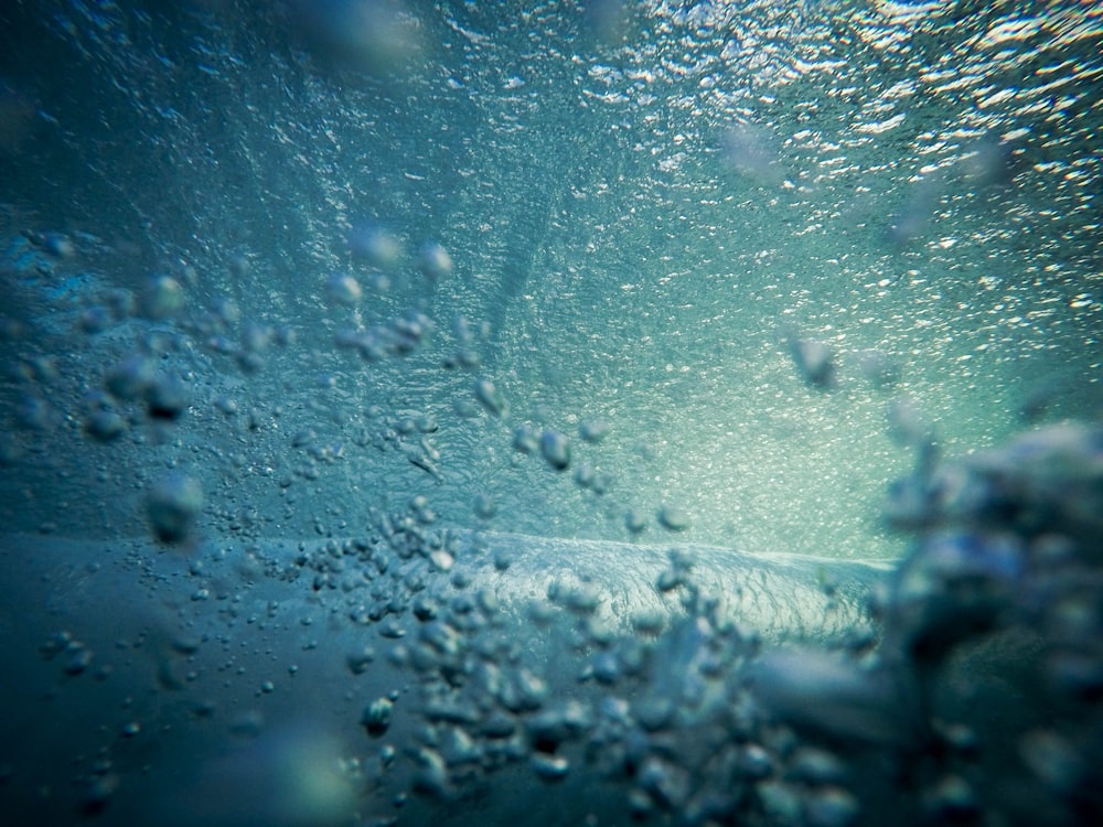 A bit of bubbling near the surface, taken underwater.
