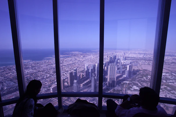 A panoramic view of the company's dual offices in India and Hong Kong, symbolizing global reach.