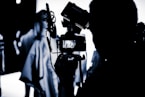 man capturing a photo