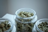 clear glass jar filled with kush