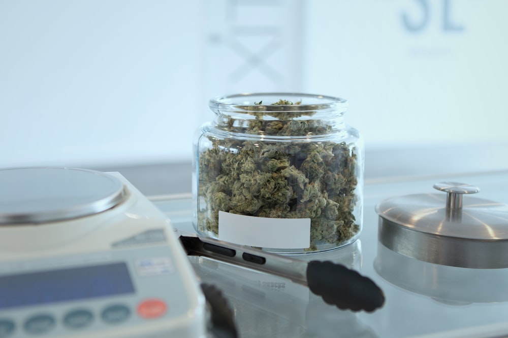 kush in jar with scale