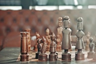 selective focus photography of chess pieces