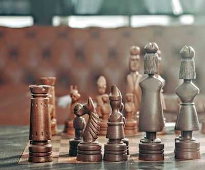 selective focus photography of chess pieces