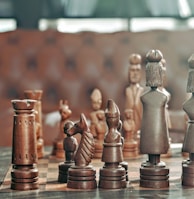 selective focus photography of chess pieces