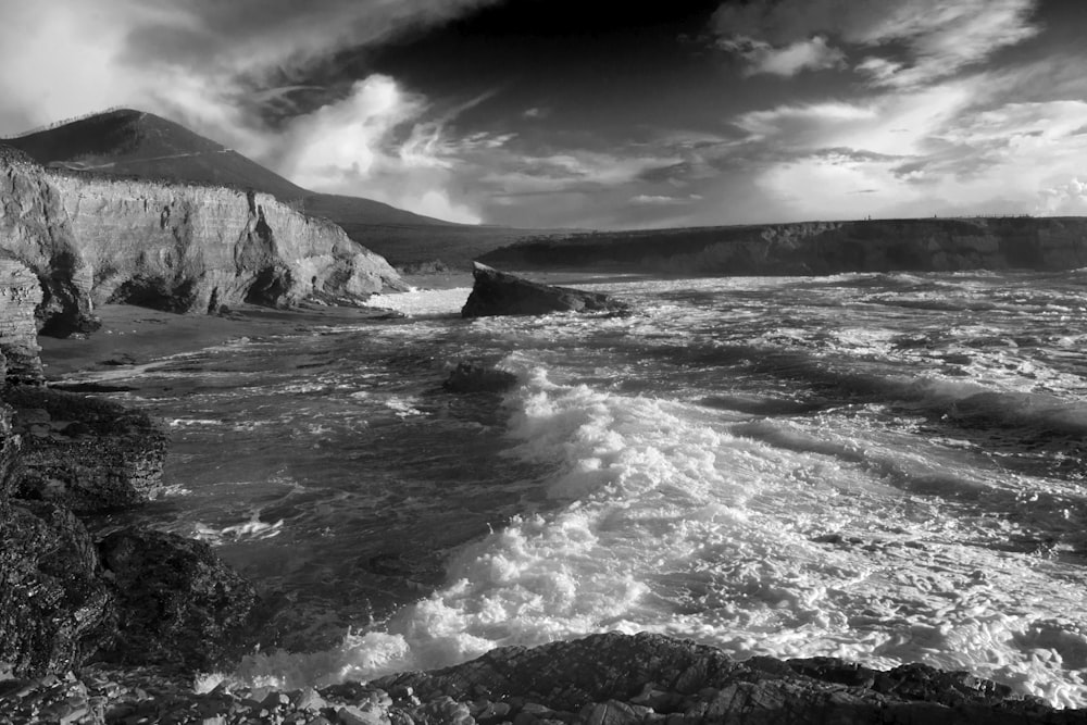 grayscale photo of body of water