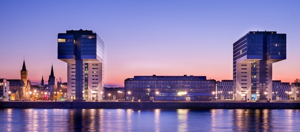 building in front of body of water