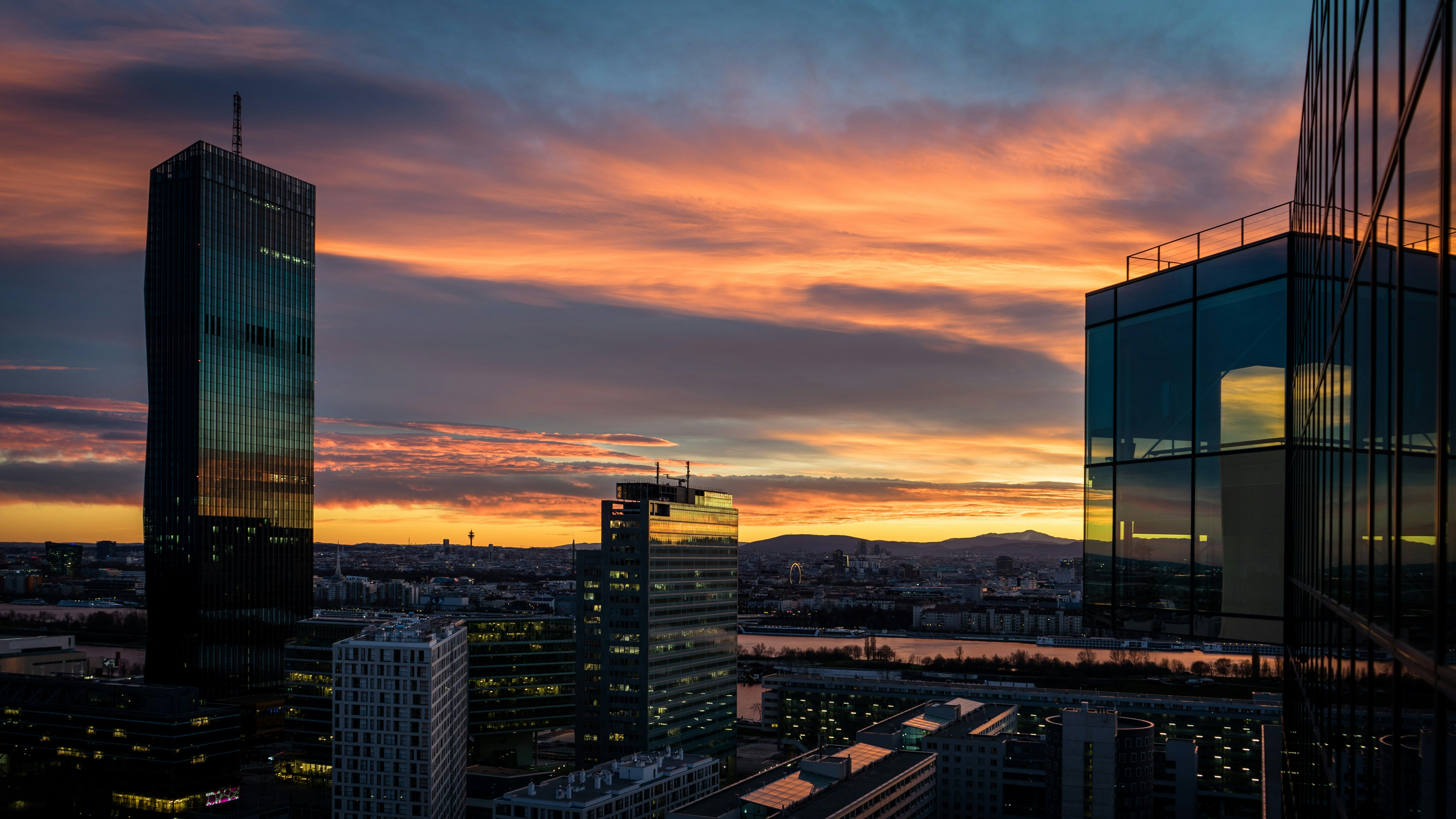 modern high rise financial district skyscraper at sunset