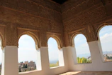 Traditional Arabian architecture with intricate geometric patterns under a clear blue sky.