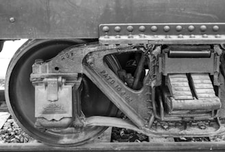 Close-up of a railcar wheel undergoing magnetic particle inspection.