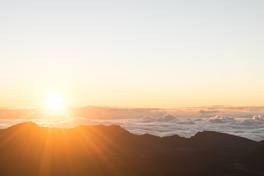 mountain range under golden hour