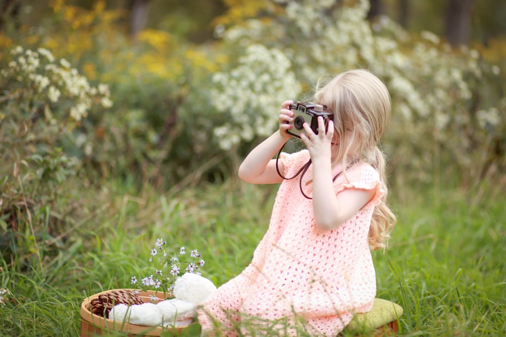 girl taking photo