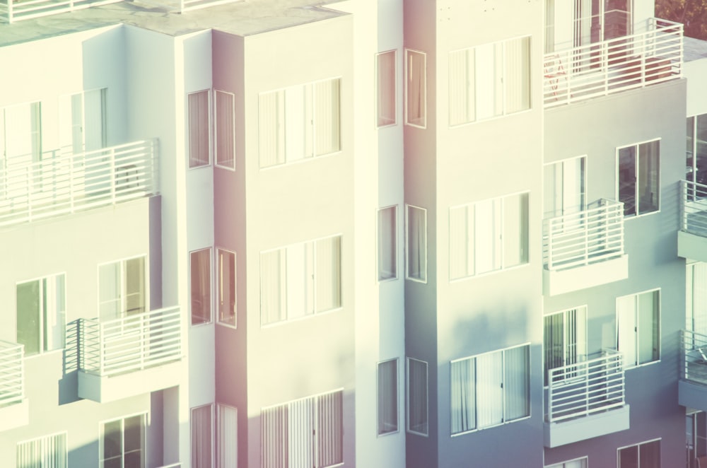 a group of buildings with balconies and balconies on them