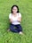 A satisfied customer giving a thumbs up in their well-maintained lawn.