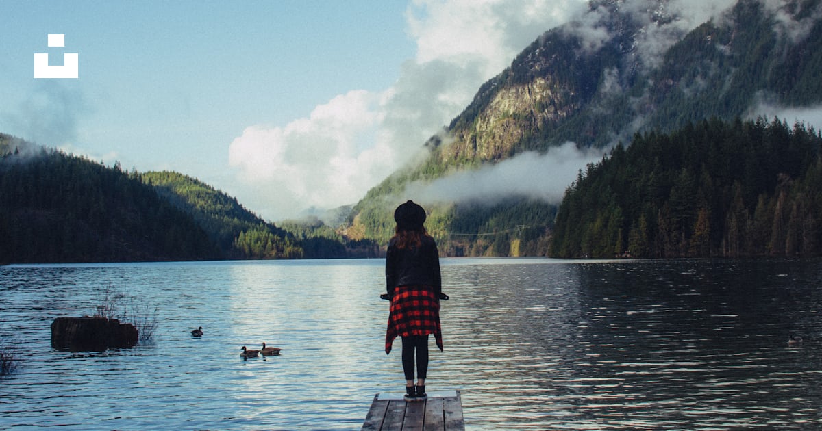 Girl standing on dock surrounded by body of water photo – Free Back ...