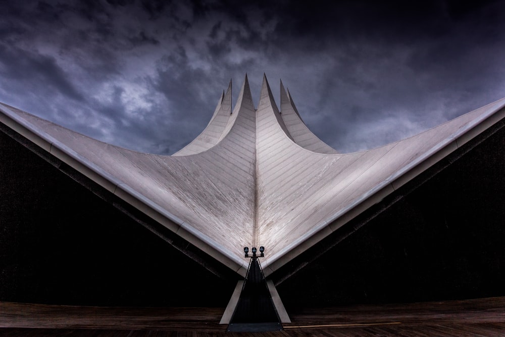 architectural photography of spiky roof building