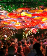 A vibrant party setup with colorful decorations and lights.