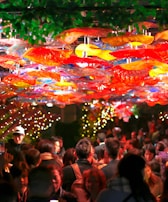 Guests enjoying a festive atmosphere surrounded by artistic air-painted decor.