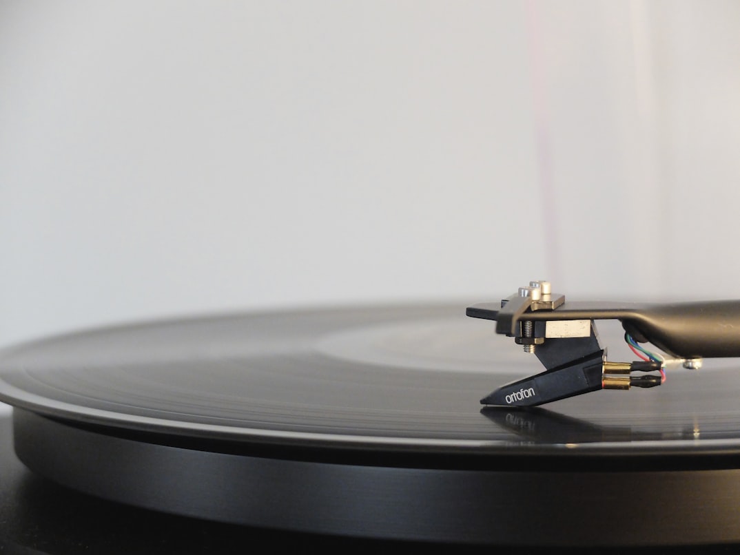 Close up shot of a record on a turntable with the needle resting on the record. 