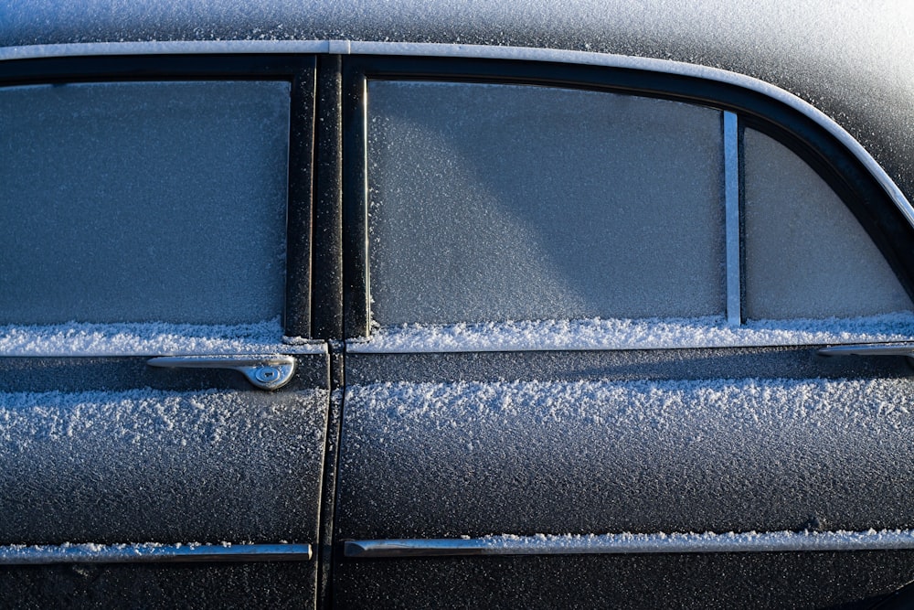 gray vehicle covered by snow