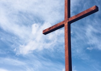 a brown wooden cross