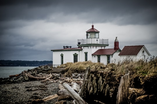 white and brown house beside body of water in West Point Lighthouse United States